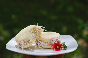 Alfajores on white plate.