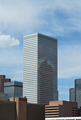 Fototapeta na wymiar Denver, Colorado, USA, downtown cityscape with Republic Plaza building in a sunny day