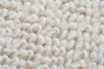 white fabric and macro shots texture concept - close up of a towel textile background