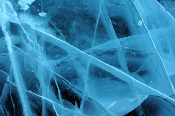 Sun rays are refracted by the transparent ice of Lake Baikal. cracks at different depths create a bizarre web