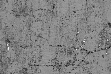 Wall fragment with scratches and cracks