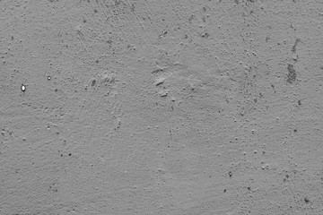 Wall fragment with scratches and cracks