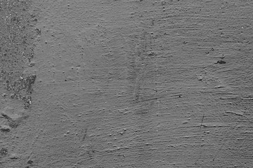 Wall fragment with scratches and cracks