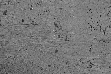 Wall fragment with scratches and cracks