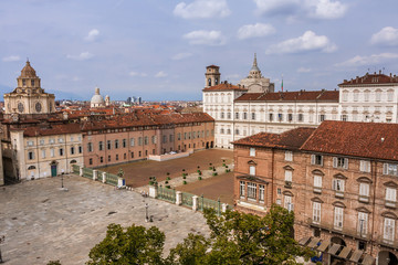 Fototapeta na wymiar An aerial view of Piazza Castello, Royal Palace, and Royal Church of San Lorenzo from the top of Madame Palace, Turin
