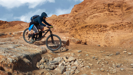Mountain Biker Riding in a Israeli Desert
