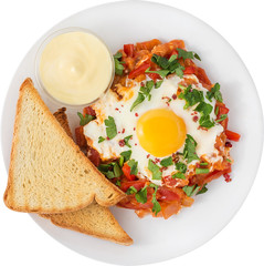 Israeli shaksusha omelet with toast and butter. Isolate