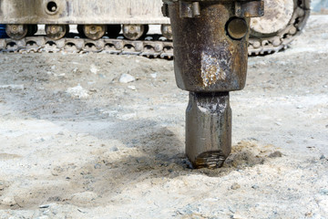 excavator-mounted hydraulic jackhammer closeup