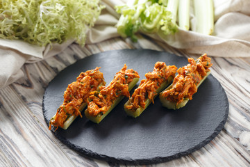 Celery with chicken in tomato sauce