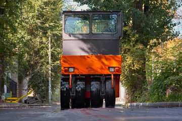 Obraz premium Hot asphalt smokes under the roller. Road construction.Road repair.