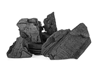 Pieces of charcoal isolated on a white background
