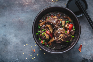 Lamb stew in a pot, asian cuisine, copy space