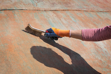 Old rusty steel metal plate cleaning