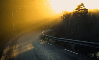 Road turn and orange fog.