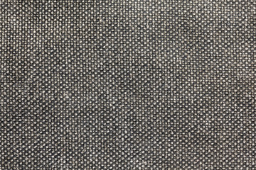 Close up background of grey fabric or abstract black fabric texture. Black background