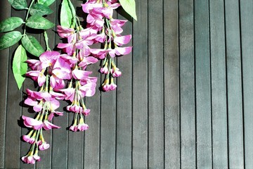 Bouquet of flowers on the wooden background