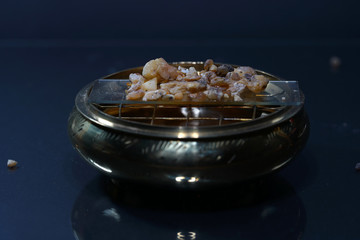 spice mix in best studio quality photographed partly isolated against black background with macro lens taken