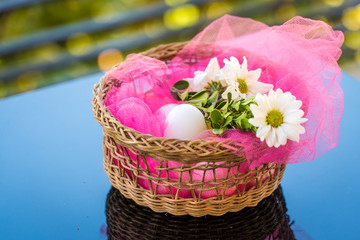 Fototapeta na wymiar Easter eggs in a festive basket