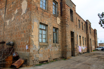 Fototapeta na wymiar Poor city blocks on the outskirts of the Armenian town.