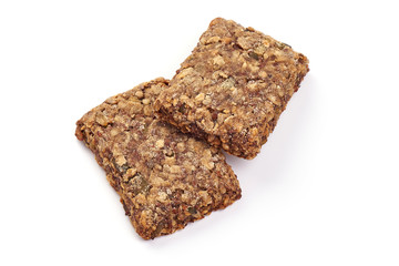 Wholegrain crispy bread slices, Healthy nutrition, close-up, isolated on white background