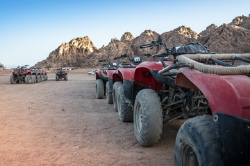 A fascinating tour in Egypt is to drive a quad bike through the desert during sunset.