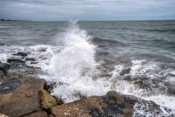 waves of the Atlantic Ocean crashing against the rocks