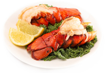 Broiled Lobster Tails on a Bed of Kale with Lemon Slices