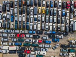 Aerial view of large car parking of car dealer. Secondhand cars.