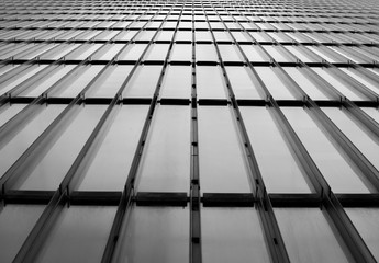 Glass and metal wall  with diagonal lines and  perspective background. black and white