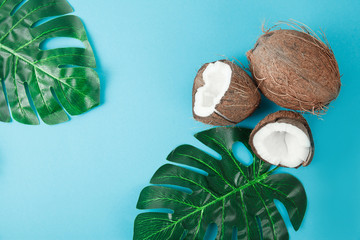 Fresh coconut on blue background