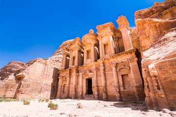 Giant temple of Monastery in sandstone and columns of the ancient Bedouin city of Petra, Jordan