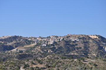 Obraz premium The beautiful natural mountain landscape in the Cyprus massif in the background at sunset