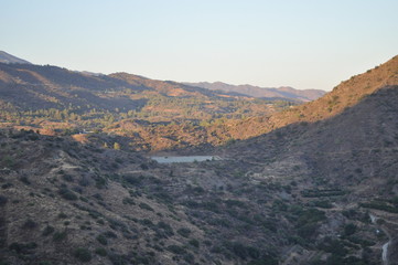 The beautiful natural mountain landscape in the Cyprus massif in the background at sunset