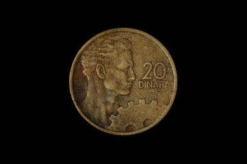 20 dinar yugoslavian coin isolated on the dark background