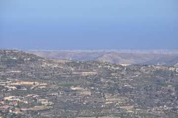 Obraz premium The beautiful natural mountain landscape in the Cyprus massif in the background at sunset