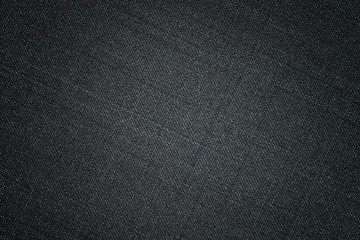 Black fabric texture. Textile background with vignette