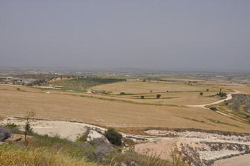 Obraz premium The beautiful natural mountain landscape in the Cyprus massif in the background at sunset