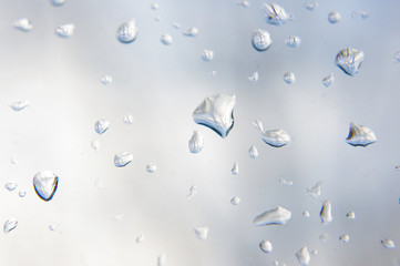 Macro close up of rain drops on the window glass