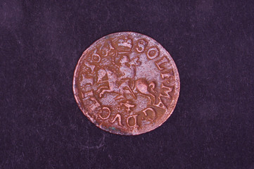 Ancient Grand Duchy of Lithuania coin shilling isolated on the black background