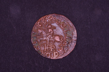 Ancient Grand Duchy of Lithuania coin shilling isolated on the black background