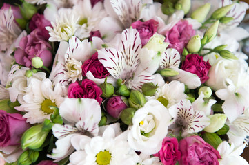 Fresh natural flowers bouquet texture. Happy holidays. Flowers delivery service. Floristic service. Flowers decoration. Fragrance of roses ranunculus orchids and chamomile flowers. Botany background