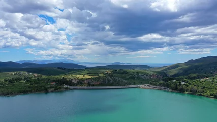 Foto op Canvas Aerial drone panoramic view of famous dam and lake of Marathon with beautiful clouds, North Attica, Greece © aerial-drone