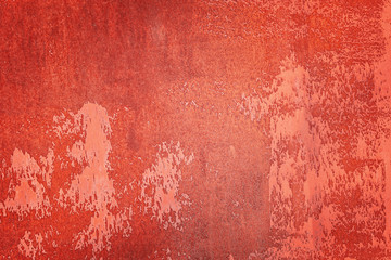 Fototapeta premium Uneven texture, with stains and smudges. Old wall painted red orange. Empty abstract background for layouts.