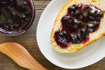 Toast and Jam on Rustic Background