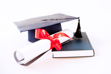 graduation ceremony  concept hat and diploma