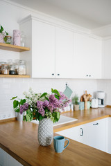 Fototapeta na wymiar Modern white kitchen in scandinavian style.