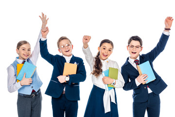Obraz premium happy schoolchildren with outstretched hands holding books Isolated On White