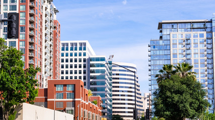 San Jose's downtown skyline, with residential high rises and modern office buildings; Silicon...