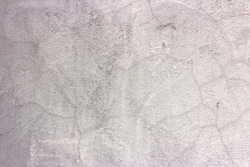 Old grunge dirty cracked vintage light grey concrete and cement mold texture wall or floor background with weathered paint and scratches