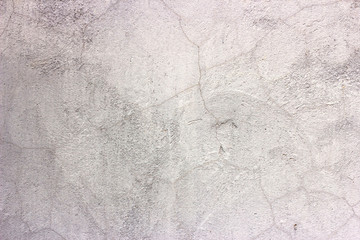 Old grunge dirty cracked vintage light grey concrete and cement mold texture wall or floor background with weathered paint and scratches